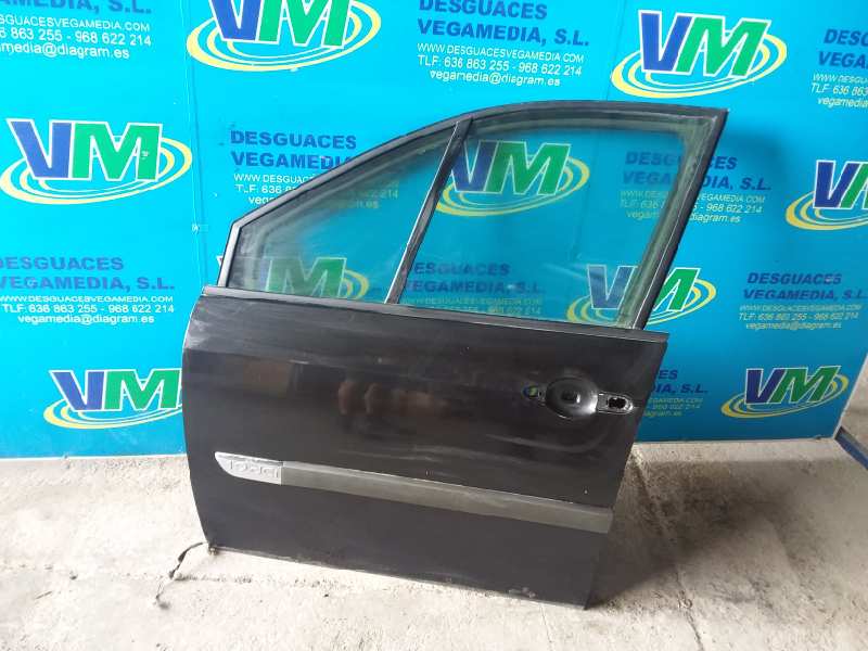 Puerta delantera izquierda, foto 1 de 2