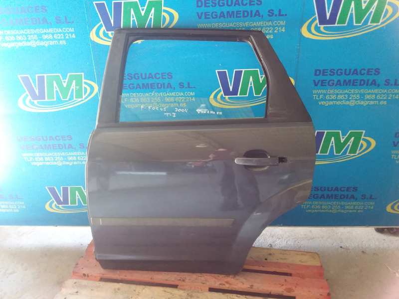 Puerta trasera izquierda, foto 1 de 3
