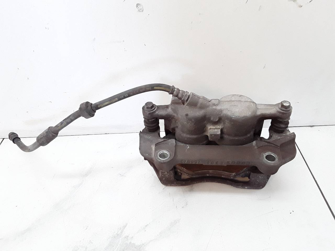 Pinza de freno delantera izquierda