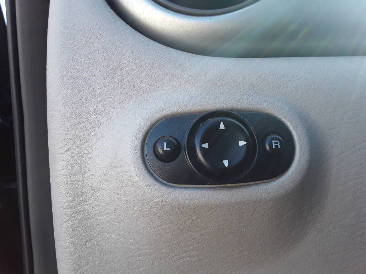 Mando retrovisor