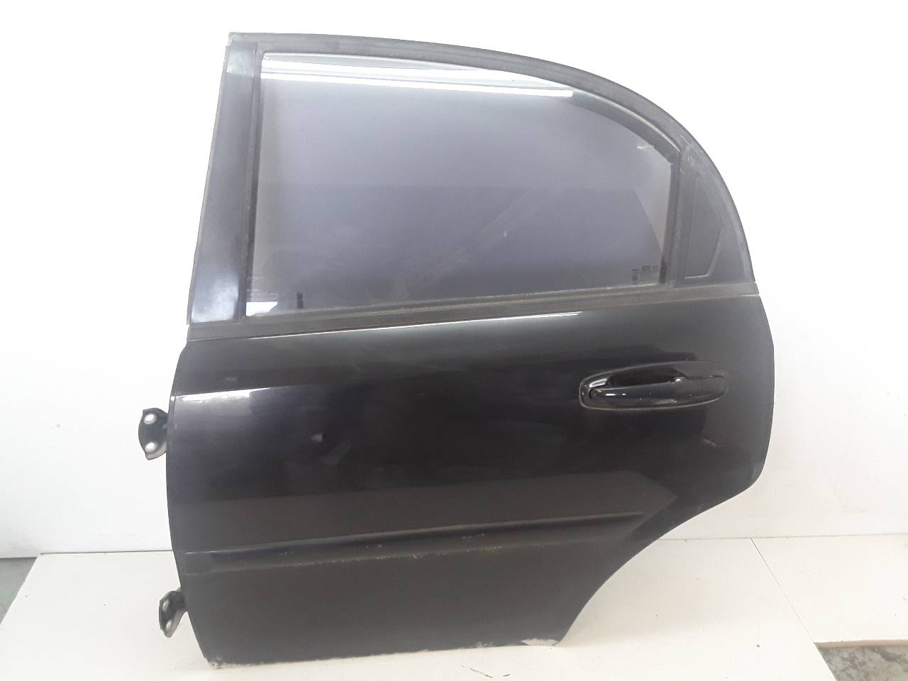Puerta trasera izquierda, foto 1 de 3
