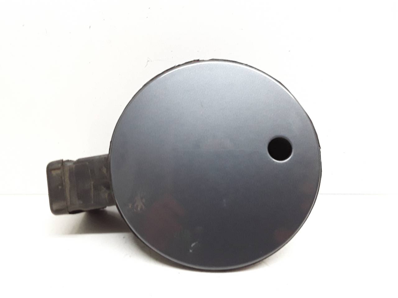 Tapa exterior combustible