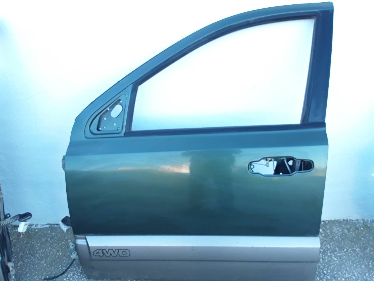 Puerta delantera izquierda, foto 1 de 3