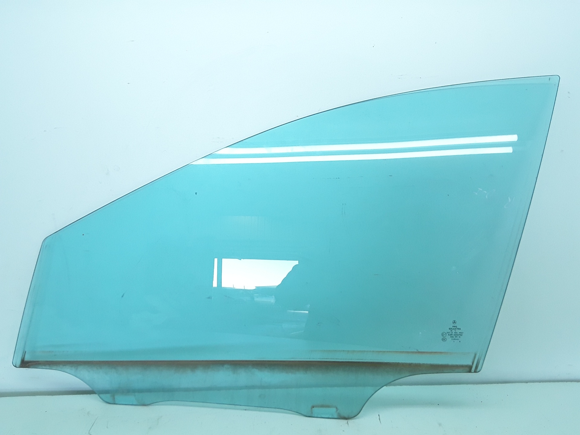 Front left window glass, photo 1 of 2
