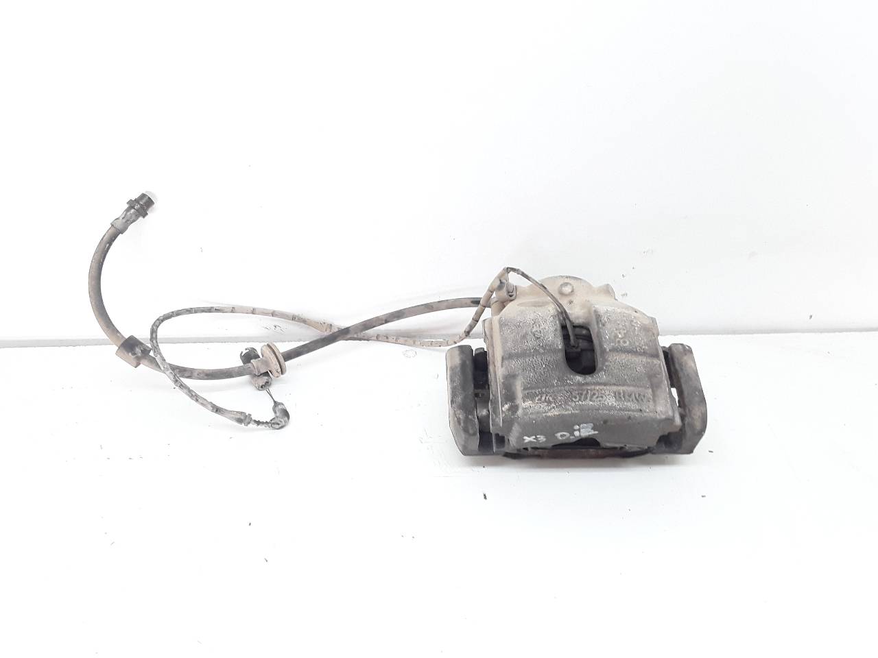 Front left brake caliper, photo 1 of 4