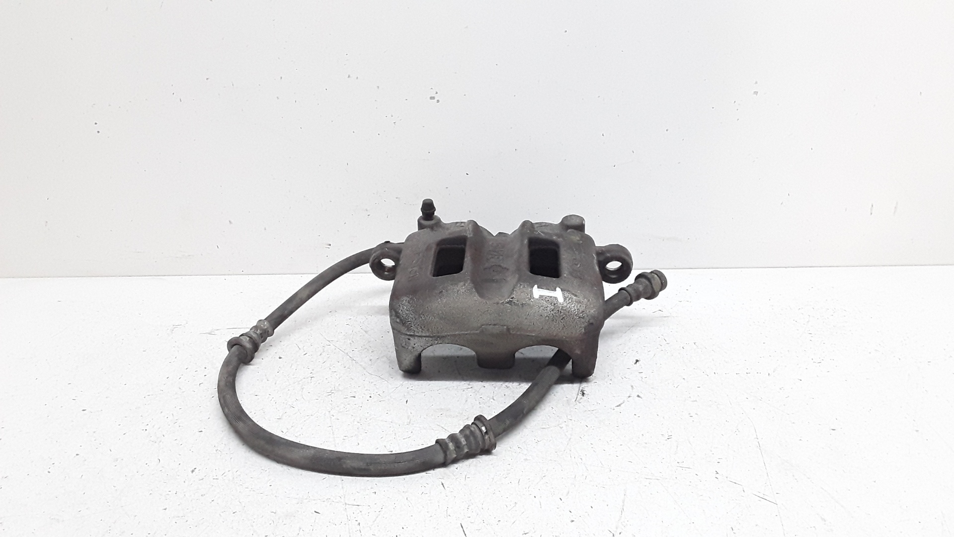 Front left brake caliper, photo 1 of 4