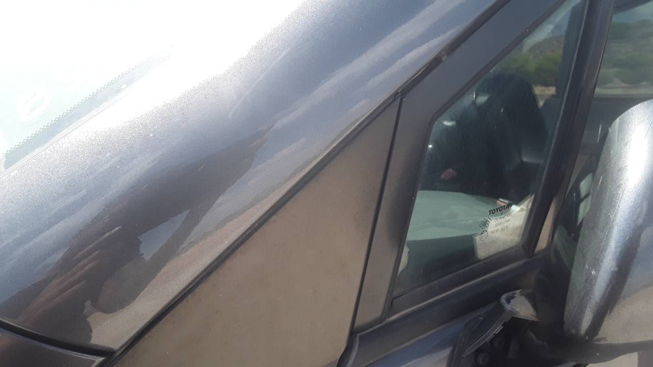 Front left quarter glass, photo 1 of 1