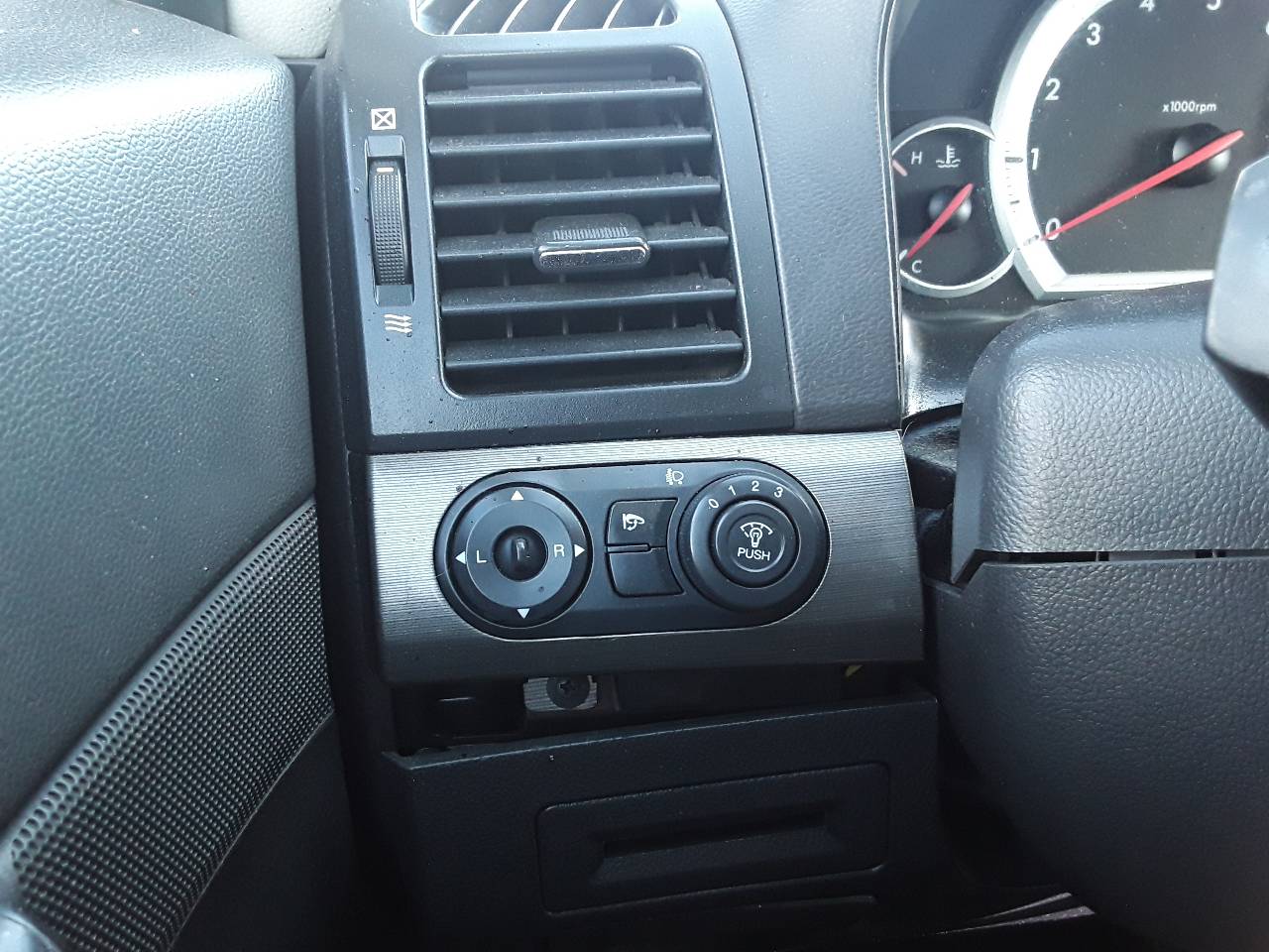 Mando retrovisor