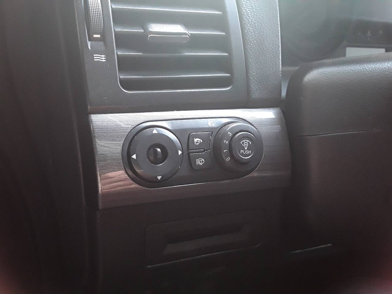 Mando retrovisor