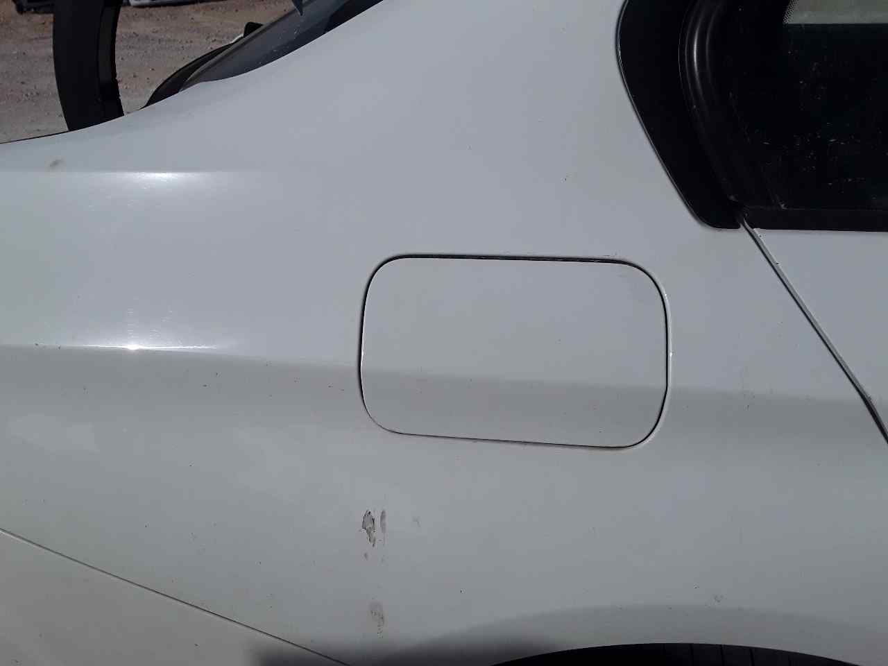 Tapa exterior combustible, foto 1 de 2