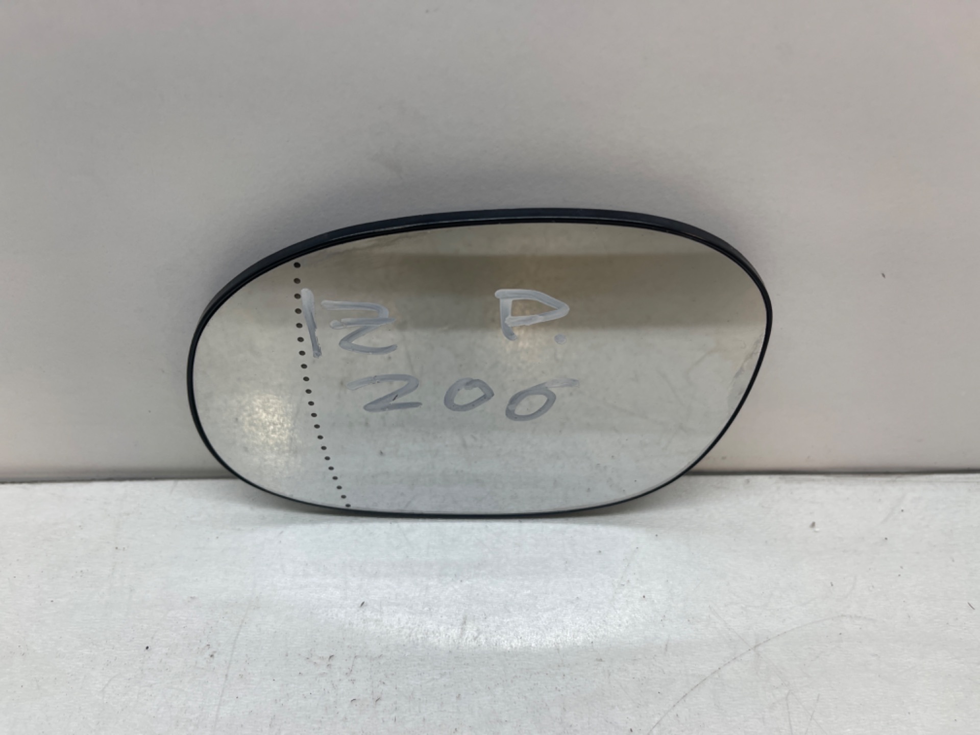 Cristal retrovisor izquierdo