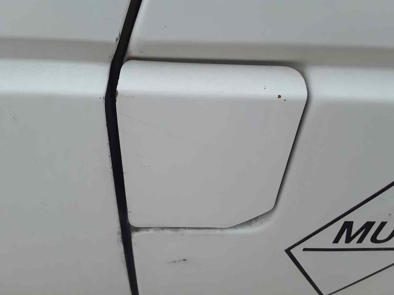 Tapa exterior combustible