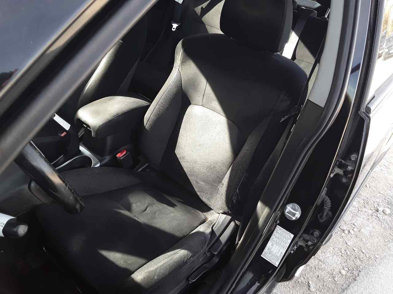 Asiento delantero izquierdo, foto 1 de 3